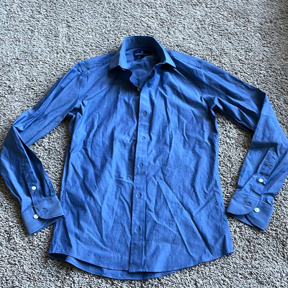 Blue button down shirt. Slim fit.